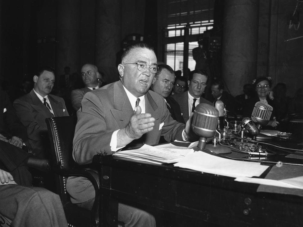 FBI director J. Edgar Hoover speaks to the Senate Crime Investigating Committee, urging them to continue its exposure of organized crime in Washington, D.C., on March 26, 1951.