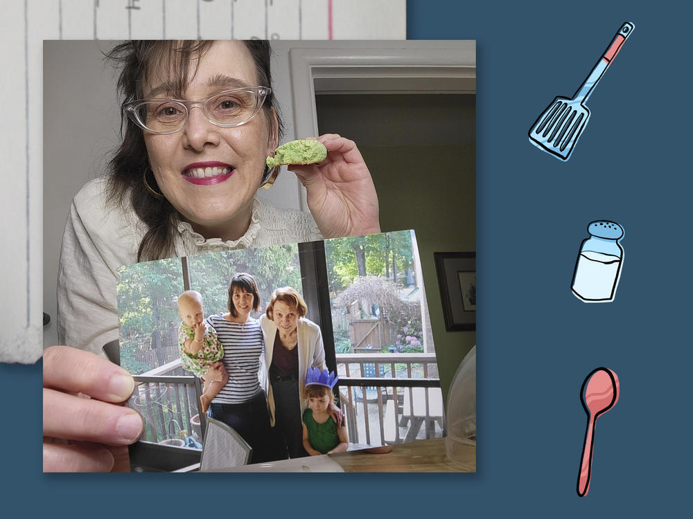 Allison Stines holds a photo of her family while she eats a family-favorite cookie: Martian droppings.