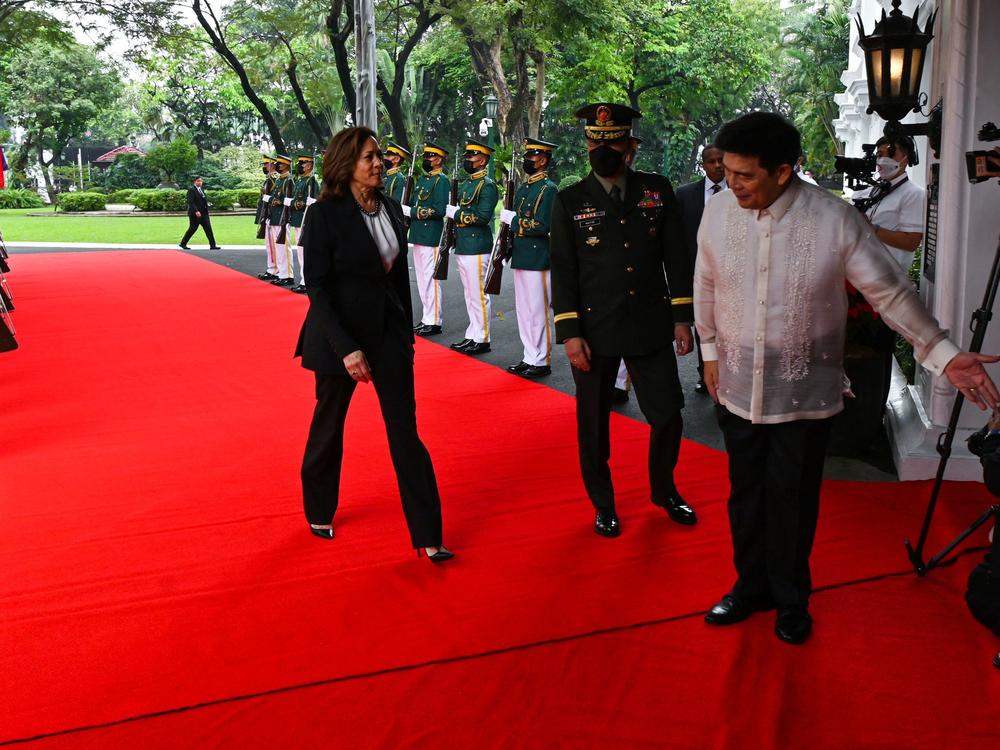 Philippines President Ferdinand Marcos Jr., right, welcomes Vice President Harris to Malacanang Palace in Manila on Nov. 21, 2022.