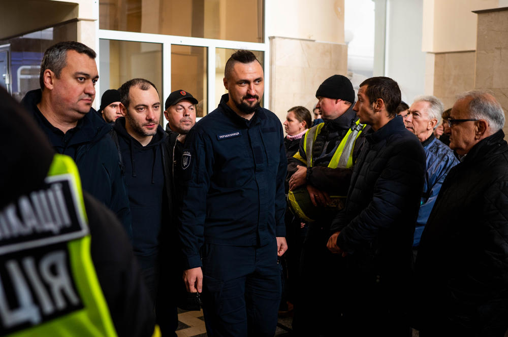 Oleksandr Kamyshin, CEO of Ukrainian Railways, walks through the Kherson railway station after the first passenger train in nine months arrived on Saturday. For now, basic services including water, heat and connectivity remain essentially nonexistent in the city.