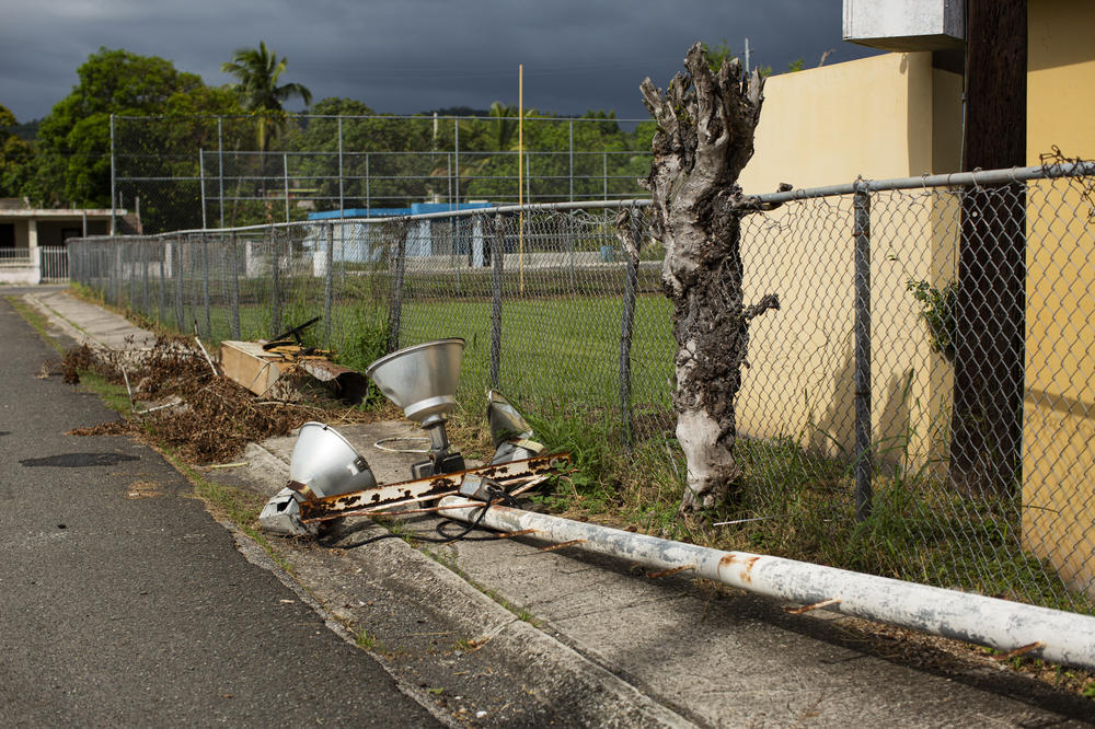 The ballfield's floodlights — damaged by Hurricane Maria in 2017 — had been repaired, allowing neighborhood children to practice baseball and softball after dark. Hurricane Fiona toppled one of the lightposts, knocking the system out of service again.