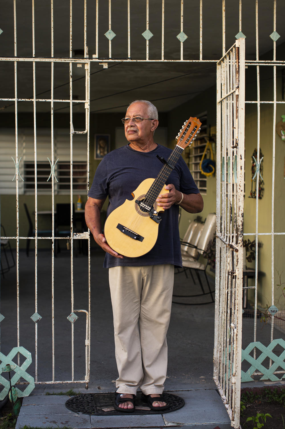 Willie Rivera's home faces the Lajas Arriba ballpark. He said that before Hurricane Fiona damaged the park again, its recent repairs and the nighttime lighting had brought out more children, infusing the neighborhood with a youthful energy that had been absent for years.