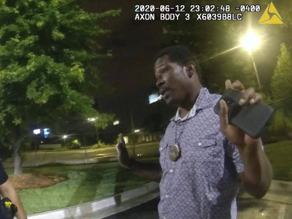 A still image from Atlanta Police body-worn camera footage showing Officer Garrett Rolfe speaking with 27-year-old Rayshard Brooks during their 40-minute encounter.