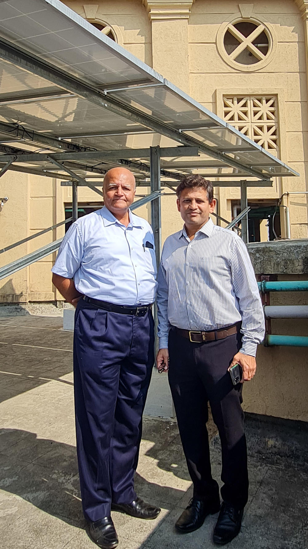 Jay Vyas, left, and his partner, Chinmay Divekar, are solar entrepreneurs, installing hundreds of small-scale solar projects on residential rooftops.