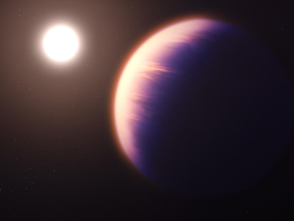 This illustration shows how the gas giant planet WASP-39 b might look as it orbits its host star.