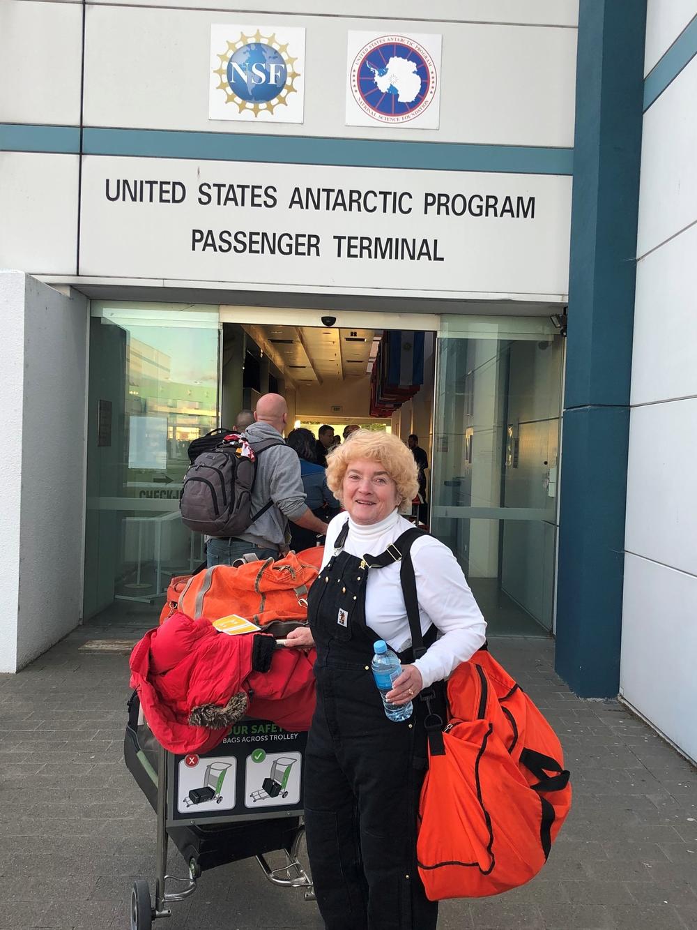 Susan MacGregor entering the terminal at Christchurch, New Zealand, for flight to McMurdo and then on to South Pole