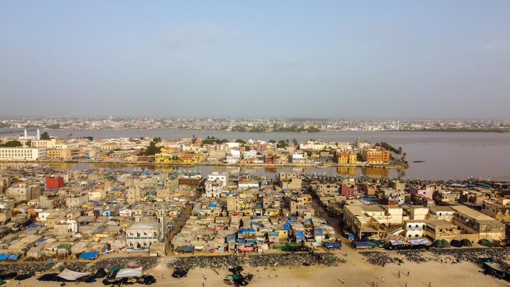 Rising seas threaten Guet Ndar and Saint-Louis in Senegal, prompting some to travel elsewhere in search of homes and work.