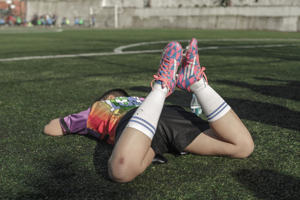 Derin, of the Muamma soccer team, rests between games at a small brainstorming event organized by Atletik Dildoa with other teams in February 2020, before the COVID-19 pandemic hit Turkey. Atletik Dildoa organized the event to discuss the ban from the previous summer.