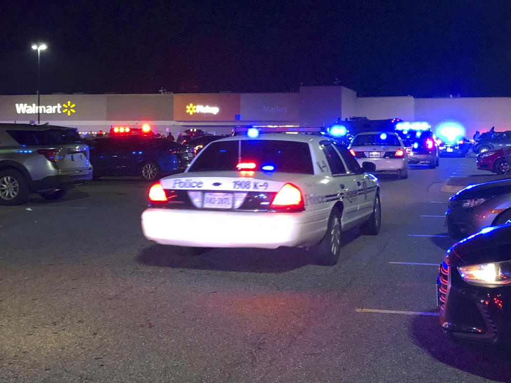 In this image from video Virginia police respond to the scene of a fatal shooting at a Walmart on Tuesday night in Chesapeake, Va.