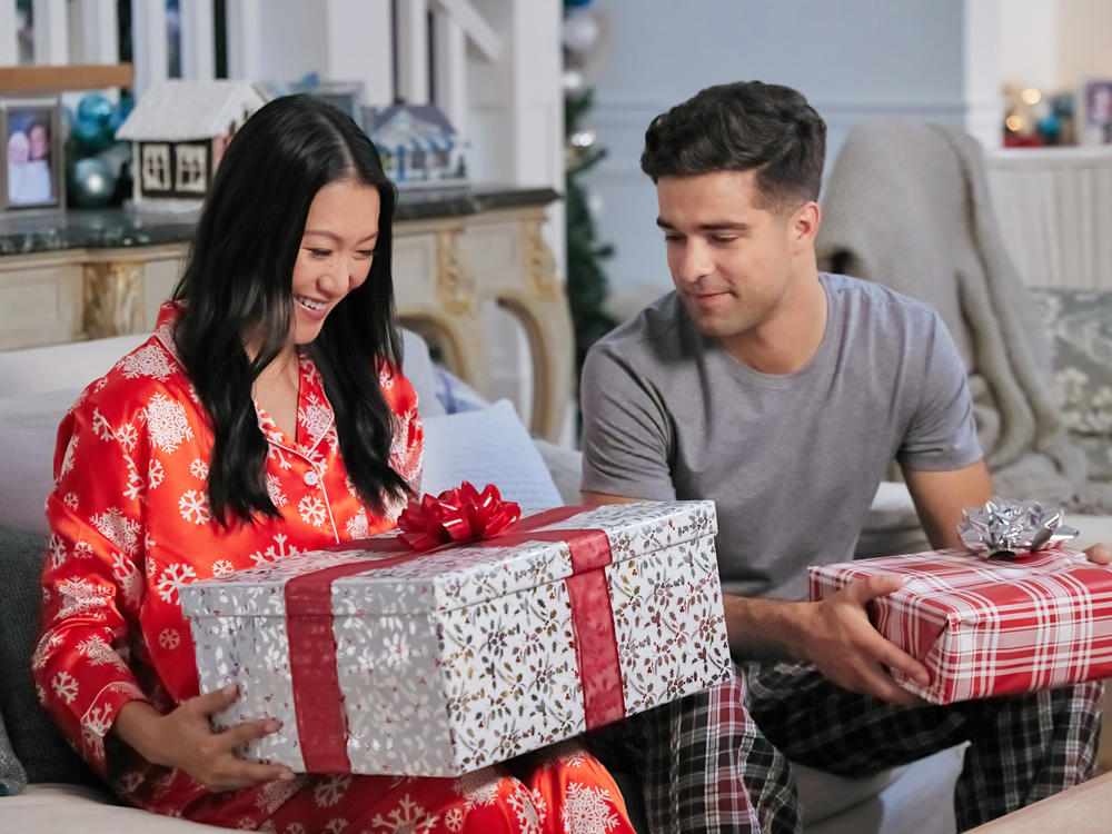 Kara Wang and Markian Tarasiuk in <em>Christmas at the Golden Dragon.</em>