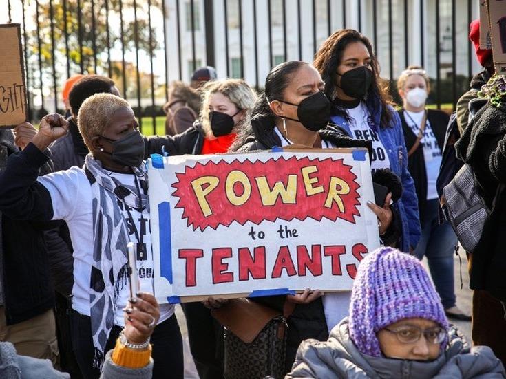 Tenant activists calling for regulation of rent hikes outside the White House.