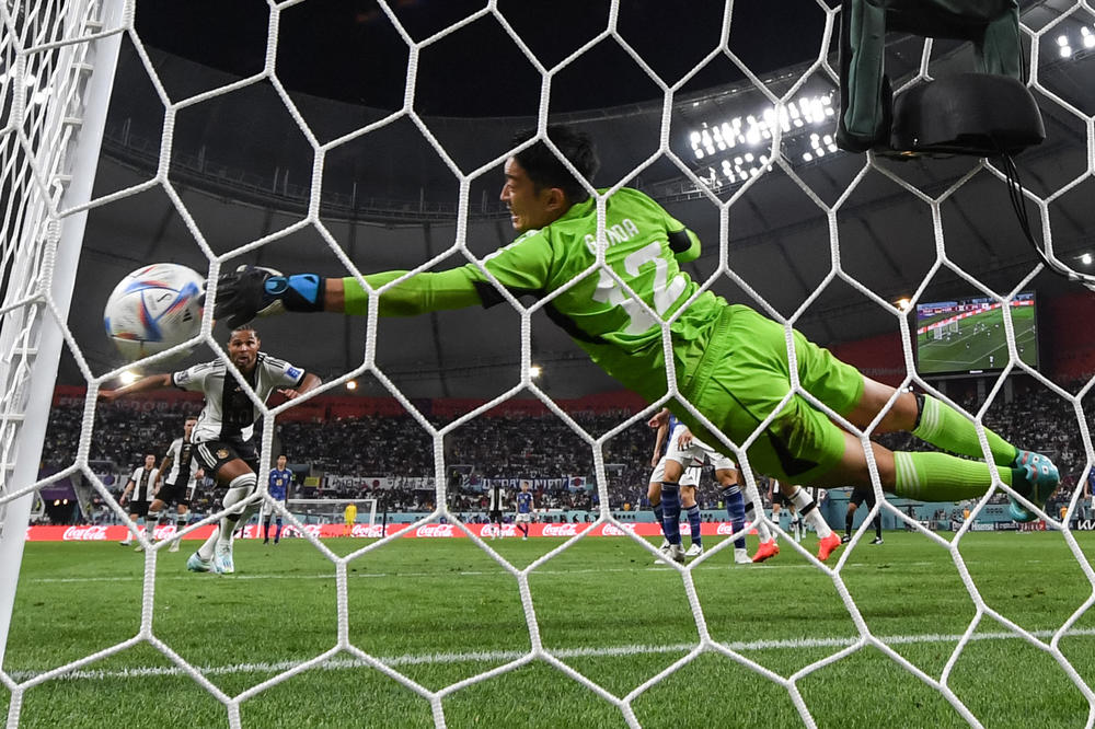 Japan's goalkeeper, Shuichi Gonda, makes a save during the team's 2022 World Cup Group E match against Germany at the Khalifa International Stadium on Wednesday, Nov. 23, 2022, in Doha, Qatar.