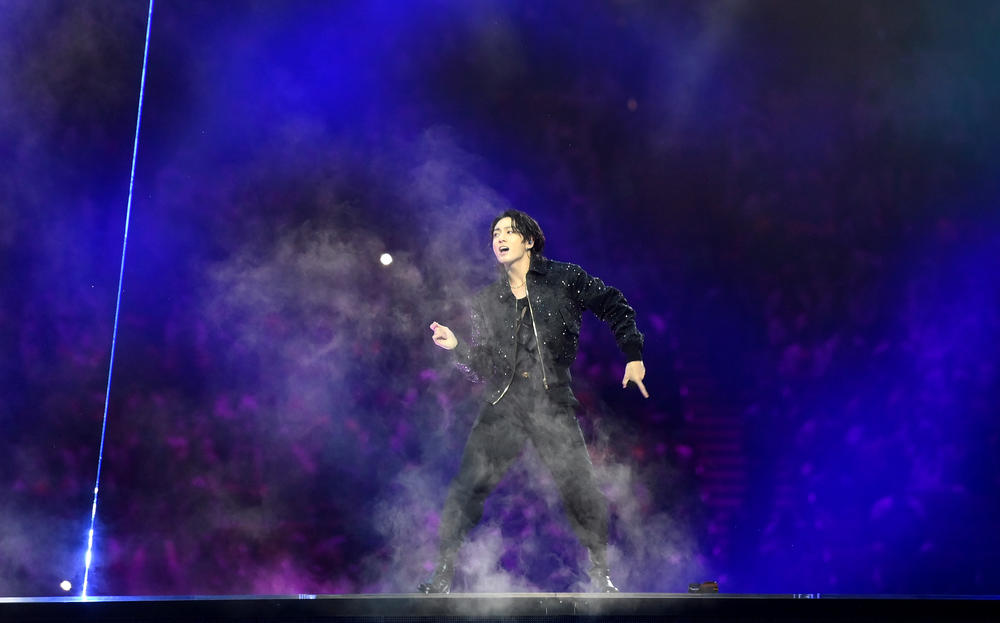 Jung Kook of BTS performs during the opening ceremony prior to a 2022 FIFA World Cup Group A match between Qatar and Ecuador at the Al Bayt Stadium on Sunday, Nov. 20, 2022, in Al Khor, Qatar.