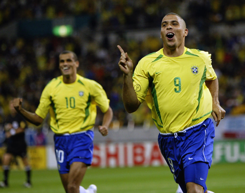 Ronaldo of Brazil celebrates scoring the winning goal during the FIFA World Cup 2002 semi-final match against Turkey played at the Saitama Stadium in Japan on June 26, 2002. Brazil won the match 1-0.