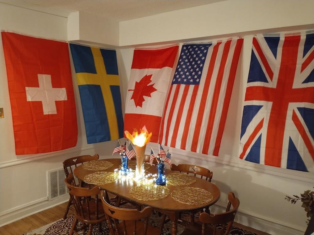 Tom Czech and Elizabeth Novak hosted an Olympics-themed party during the Tokyo games. The decor included the Olympics rings, country flags and the Olympics torch.