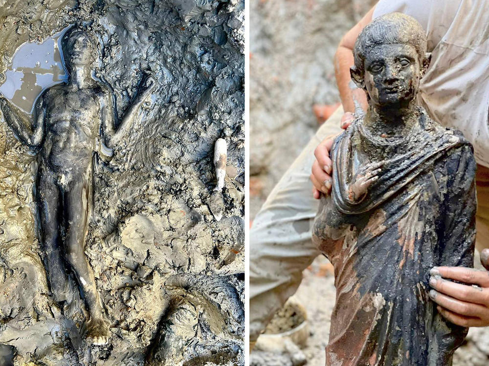 Statues at the site of the discovery of two dozen well-preserved bronze statues from an ancient Tuscan thermal spring in San Casciano dei Bagni, Italy on Nov. 3.