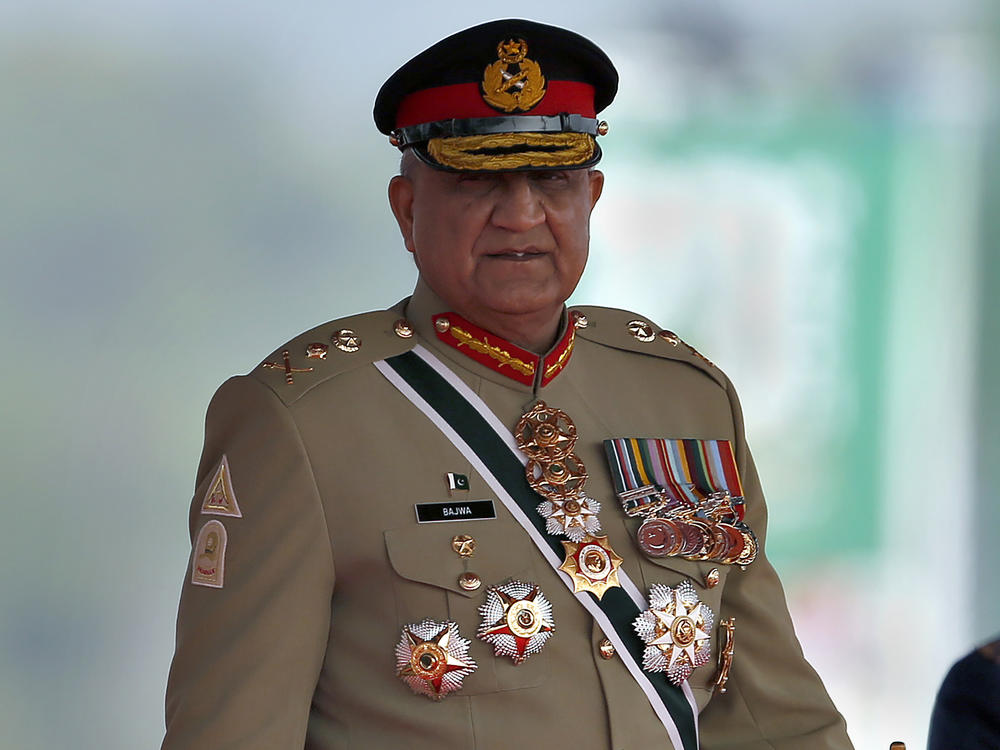 Pakistan's Army Chief Gen. Qamar Javed Bajwa arrives for a military parade to mark Pakistan National Day in Islamabad, Pakistan, March 23, 2022. He is retiring early next week.