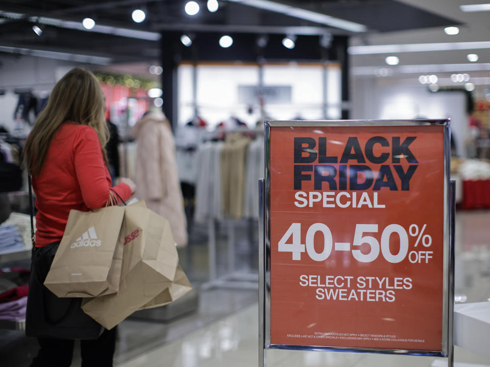 A shopper browses Black Friday sales at a Macy's store in Jersey City, N.J.