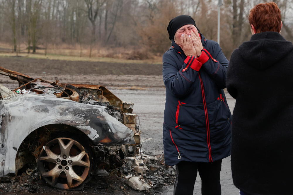 Oksana Breus cries as she arrives to pick up her son's body amid Russia's attack on Ukraine, in Nova Basan in April.
