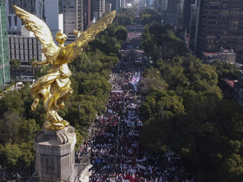 Supporters of Mexican President Andrés Manuel López Obrador march in Mexico City, Sunday, Nov. 27, 2022.