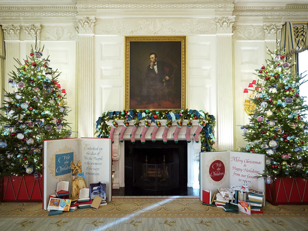 The State Dining Room of the White House is decorated for the holiday season with stockings for family members of President Biden and first lady Jill Biden.