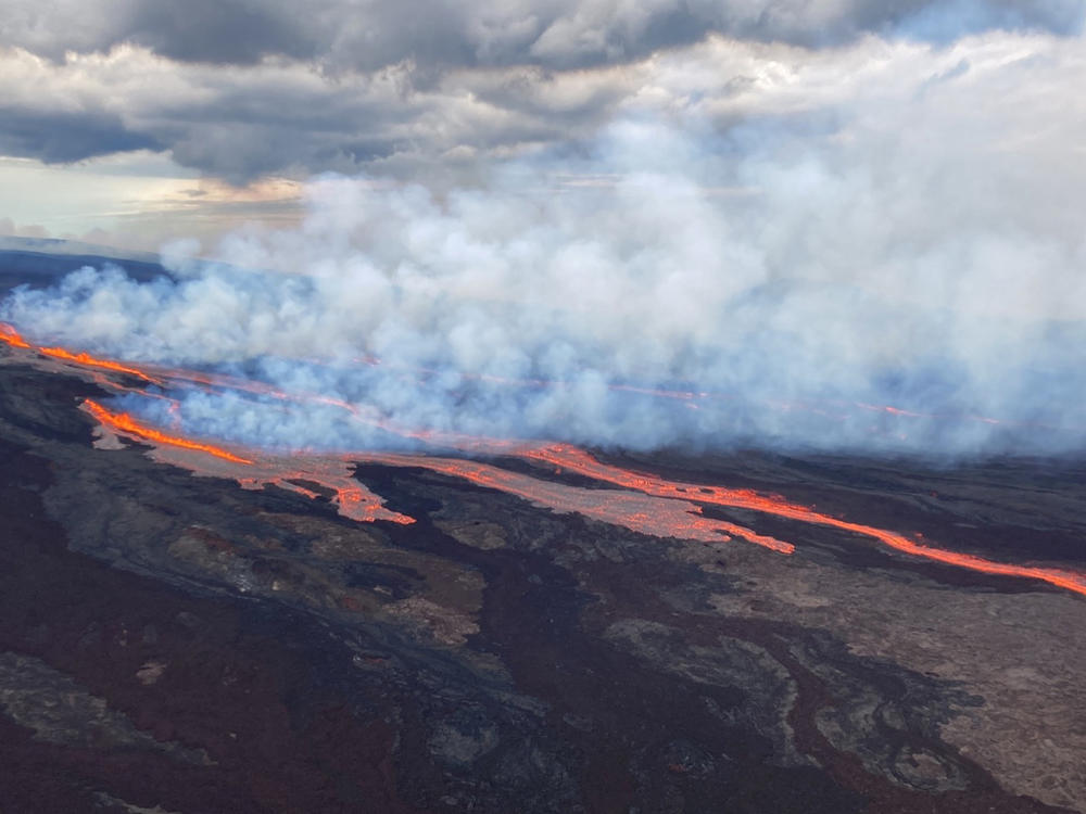 In this aerial photo released Monday by the U.S. Geological Survey, the Mauna Loa volcano is seen erupting from vents on the Northeast Rift Zone on the Big Island of Hawaii.