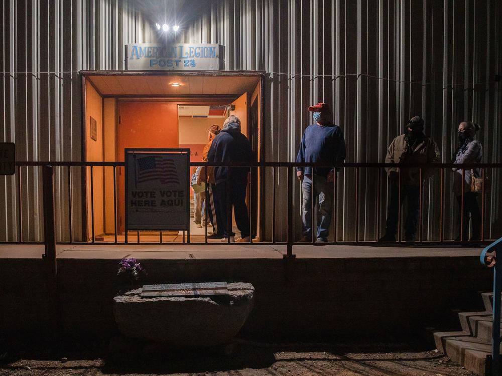 People wait in line to vote on Election Day 2020 in Tombstone, Ariz., in Cochise County. The county's Republican-led leadership has voted to delay certifying its 2022 election results, despite a state deadline on Monday.