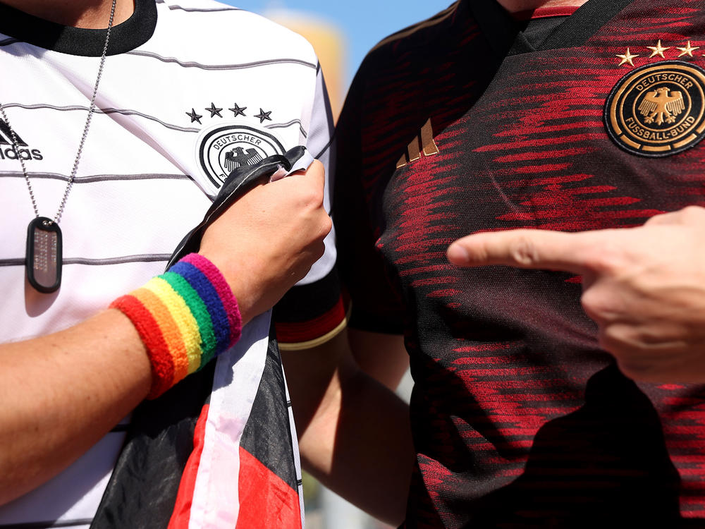 Germany fans pose for a photo on Nov. 22 in Doha, Qatar.