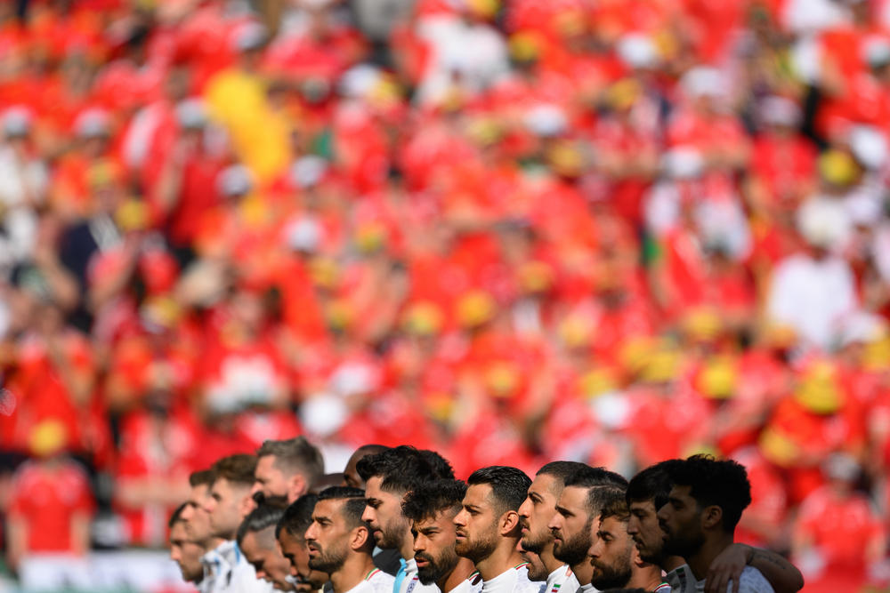 The players on Iran's national team sang for the anthem at their second match of the tournament, reversing course after their silence in their opening match against England.