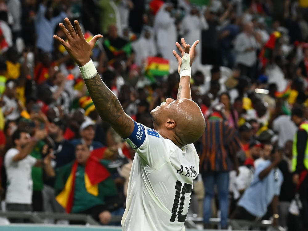 Ghana's André Ayew celebrates after Mohammed Kudus scores the team's third goal in a 2022 World Cup Group H match against South Korea on Monday, Nov. 28, 2022, at the Education City Stadium in Al Rayyan, Qatar.