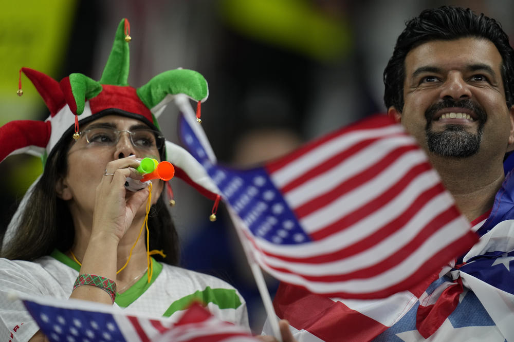 Supporters cheer prior to the World Cup group B soccer match between Iran and the United States at Al Thumama Stadium in Doha, Qatar.