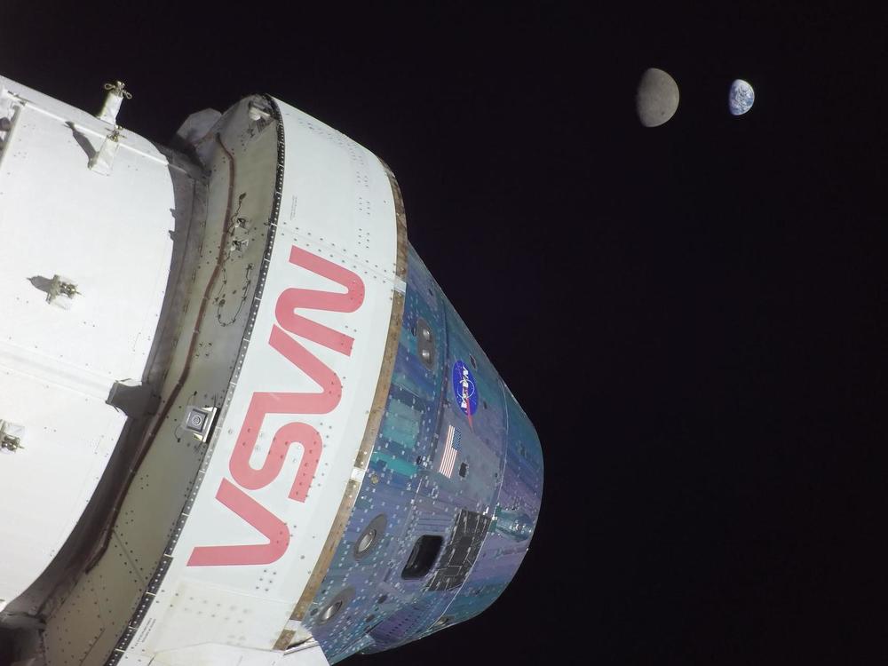 Orion's maximum distance from Earth was achieved on flight day 13, when it was 268,563 miles away. That's farther than any other spacecraft built for people--but only mannequins were on board.