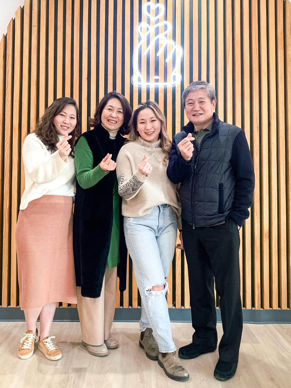 Monica Lee, third from left, with her sister, mother and father.