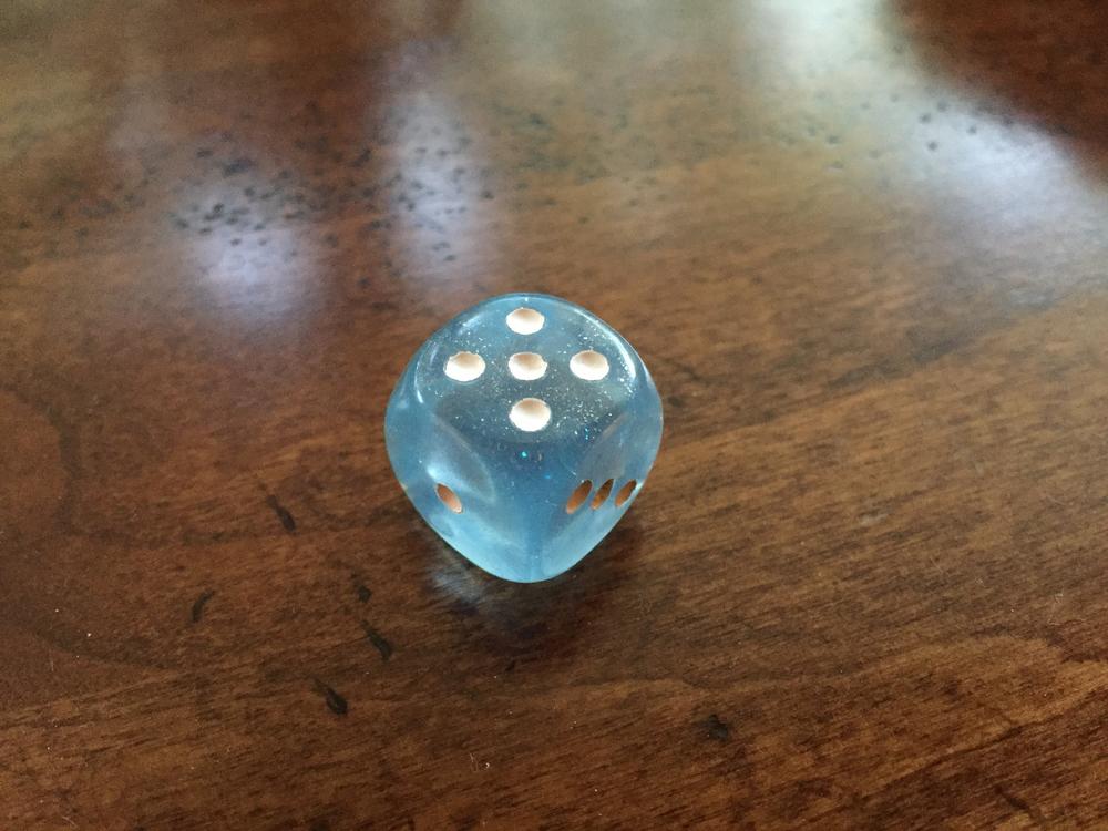 Jeff Stout says this blue die is the last gift he ever got from his son, who died in 2015 at the age of 31.