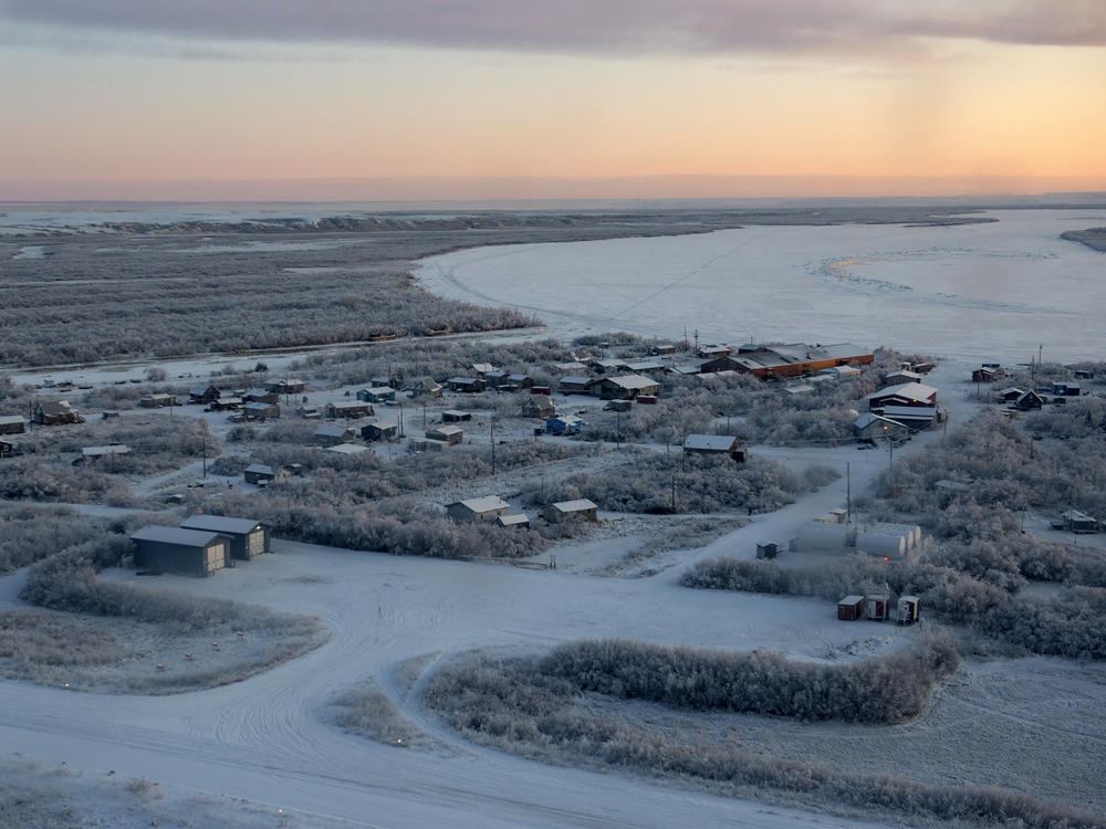 This photo from 2019 provided by the U.S. Air Force/Alaska National Guard photo shows how closely the village of Napakiak, Alaska is at risk of severe erosion by the nearby Kuskokwim River.