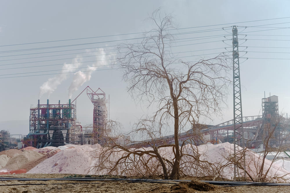 Israel's Dead Sea Works factory piles up white potash, which is extracted from the Dead Sea and exported for fertilizer, in the southern part of the Dead Sea on Nov. 10. The company was founded by Israel in 1952 and mines the lake for minerals such as potash, bromine and bromine compounds.