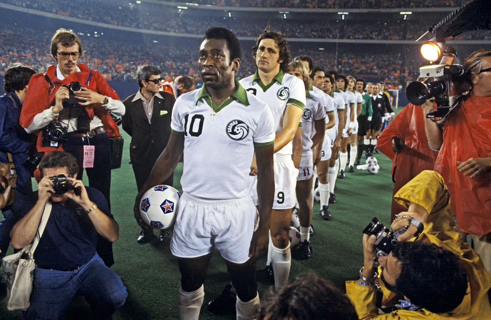 Pelé and his New York Cosmos teammates line up before their NASL semifinals match against the Rochester Lancers at Giants Stadium on Aug. 24, 1977.