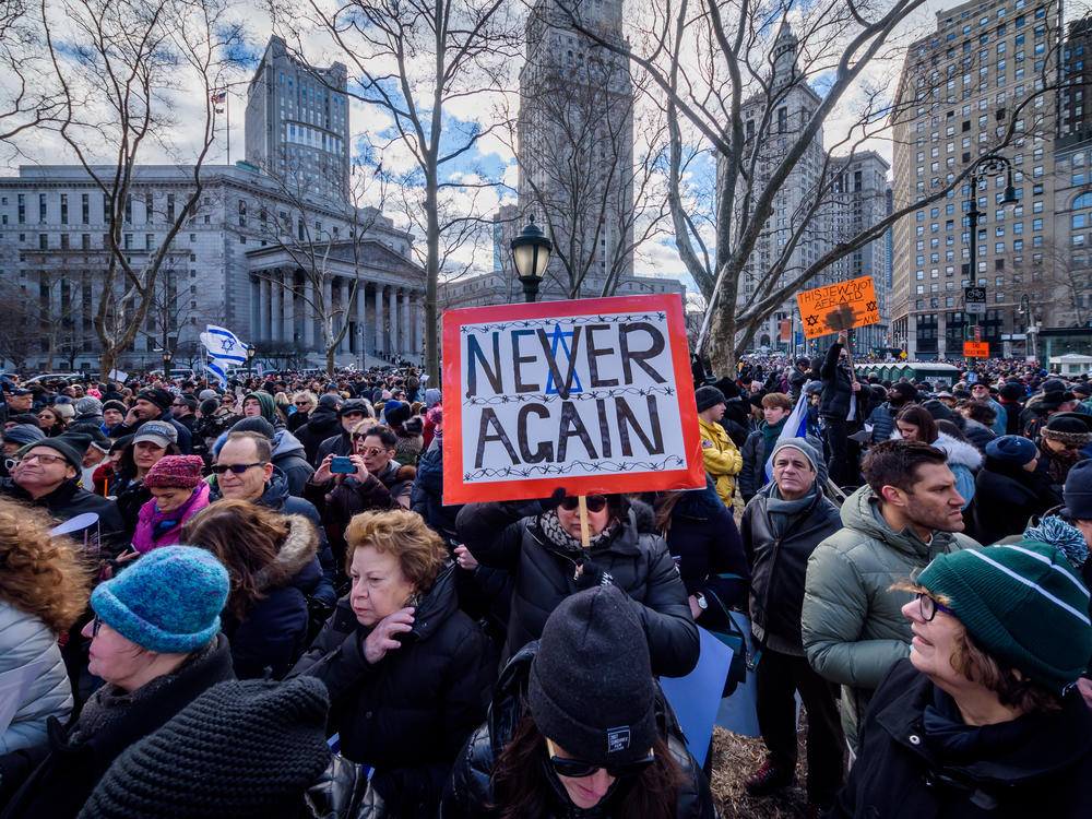 A participant holding a sign at a 2020 solidarity march in unity against the rise of antisemitism. The Anti-Defamation League reported that antisemitic incidents reached an all-time high in 2021.
