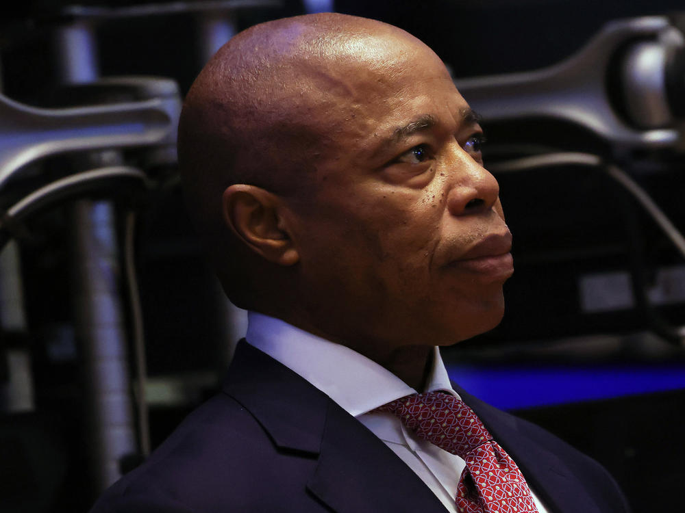 New York City Mayor Eric Adams visits the New York Stock Exchange on Nov. 17. This week, he announced that officials will begin hospitalizing more homeless people by involuntarily providing care to those deemed to be in 