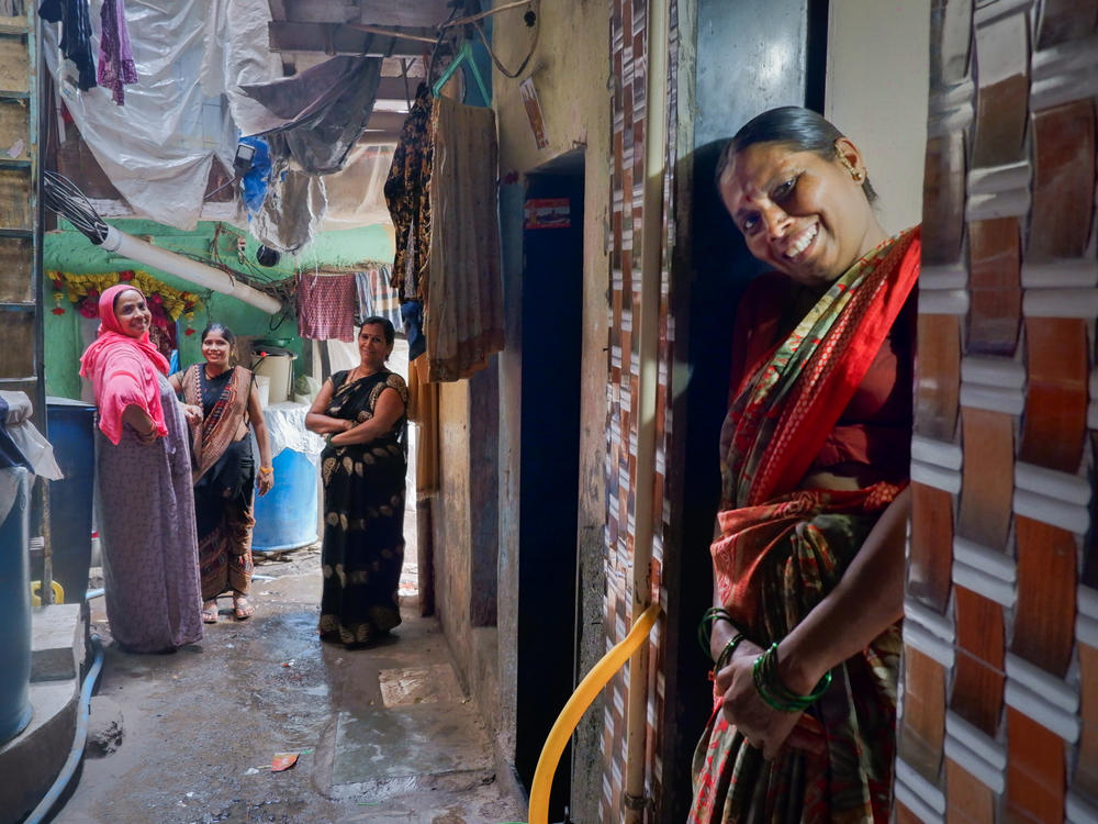 Many of the women in Sangeeta Siwan's Mumbai neighborhood lost their jobs during the pandemic, but they banded together to help each other through the lockdowns. From left to right: Kalawanti Yadav, Sageeta Wadule, Sangeeta Pandey and Ambika Kalshetty.