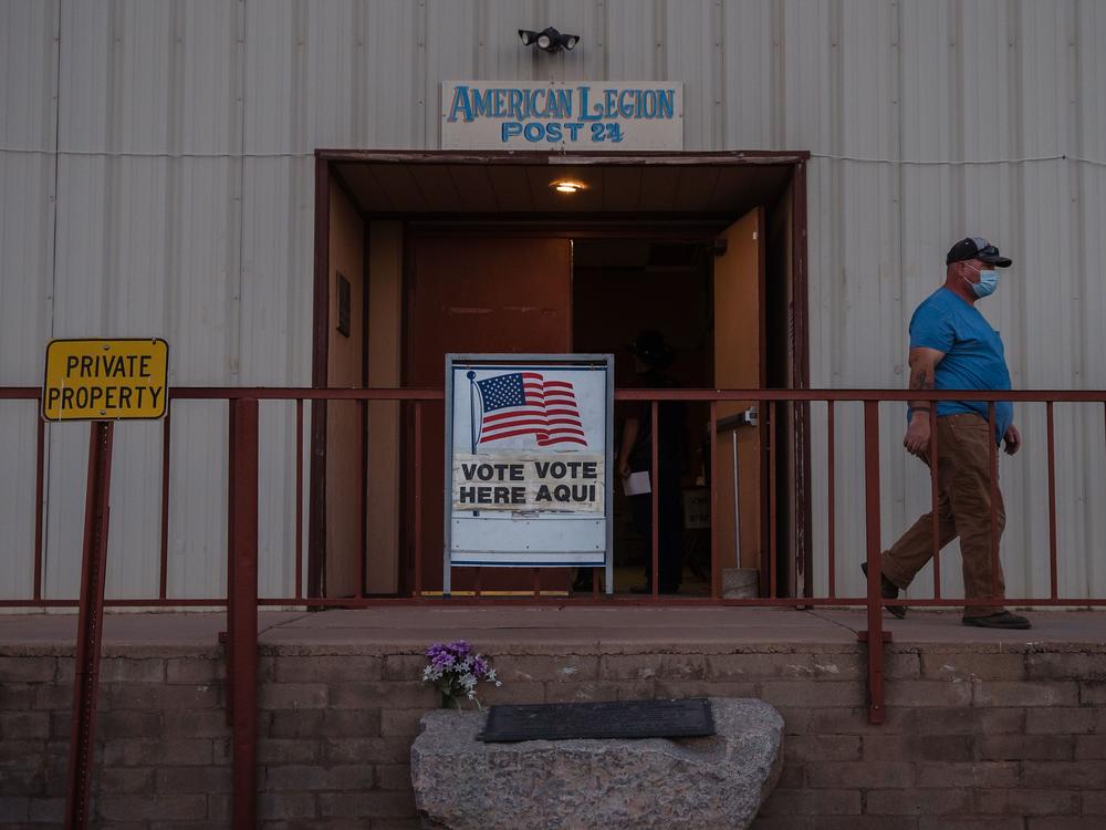 A man walks out after casting his vote on Election Day 2020 in Tombstone, Ariz., in Cochise County.