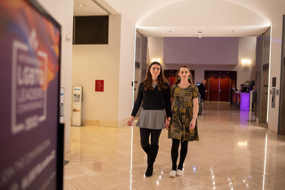 Zooey Zephyr, 34, state Rep.-elect for the 100th district of the Montana House of Representatives, walks hand-in-hand with her girlfriend, Erin Reed, 34, at the JW Marriott Hotel in Washington D.C., on Dec. 2, 2022.