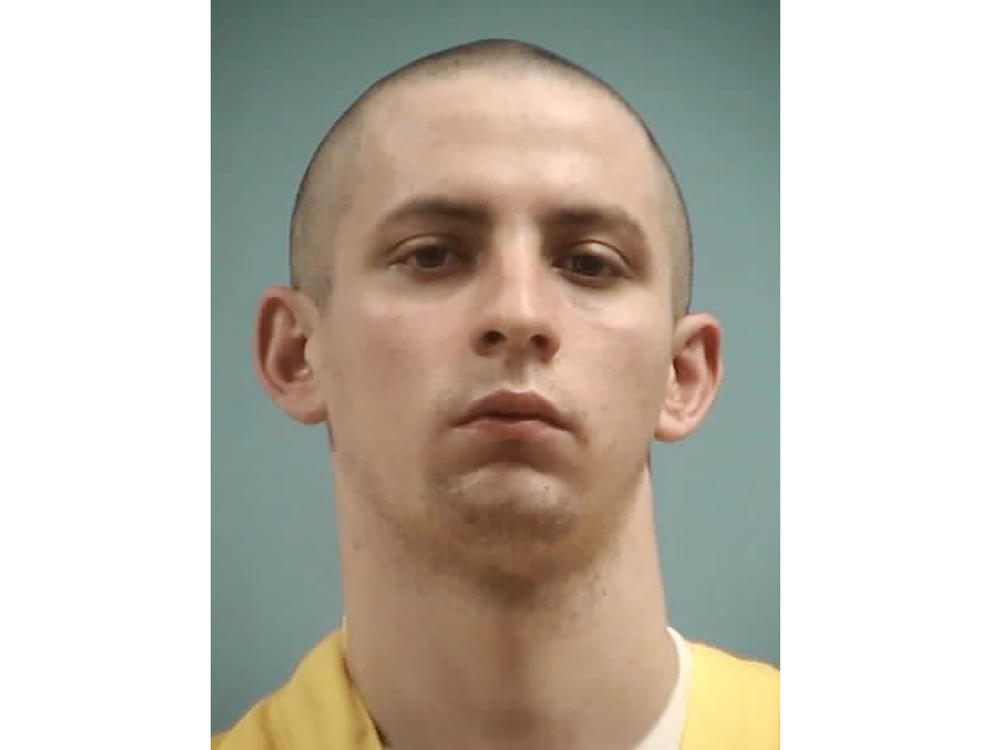 Axel Cox, 24, of Gulfport, Miss., was charged with violating the Fair Housing Act after burning a cross in front of a Black family because of their race.