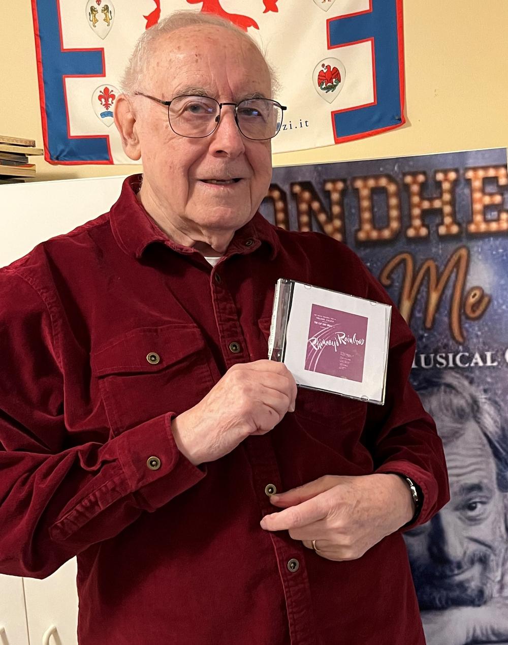 Journalist Paul Salsini holds the CD containing a rare live recording of <em>Phinney's Rainbow</em>. He found the CD while cleaning up his office.<em></em>