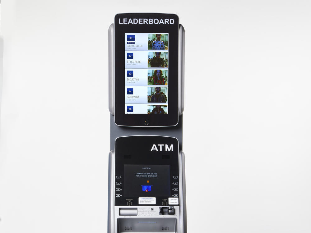 Brooklyn-based art collective MSCHF created an ATM that displays and ranks the cash balance of users.