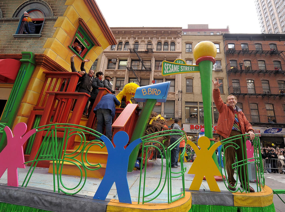 <em>Sesame Street</em>'s Bob McGrath waves to the crowd while riding on a float during the 2009 Macy's Thanksgiving Day parade in New York City. The longtime, original cast member of the iconic children's show died on Sunday.