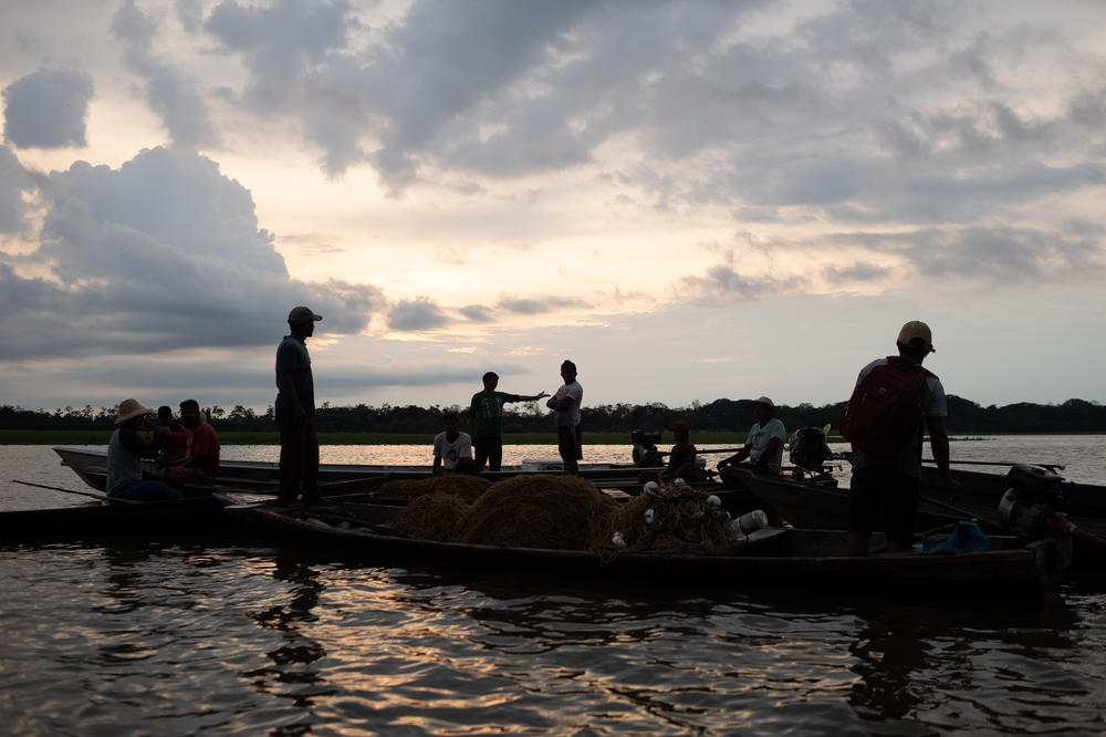 Riverside fishermen in their canoes on Nov. 15.