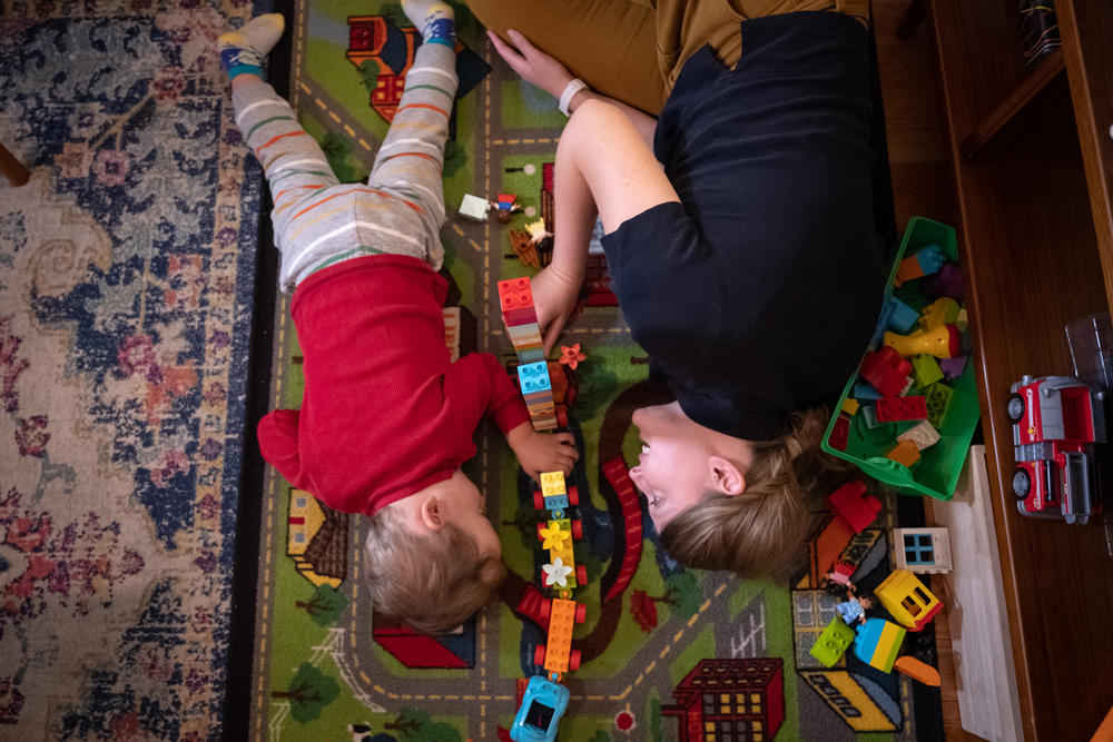 Life Kit visuals editor Becky Harlan engages her 2-year-old son, August Grabowsky, in 