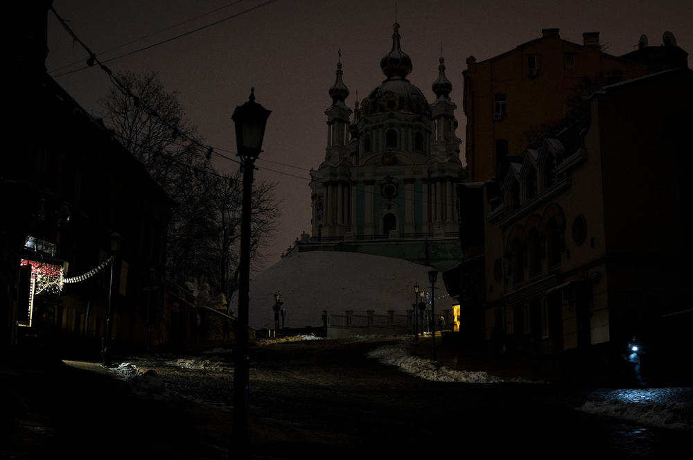 St. Andrew's Church looms above the darkened Andriivskyi Descent in Kyiv on Nov. 28.
