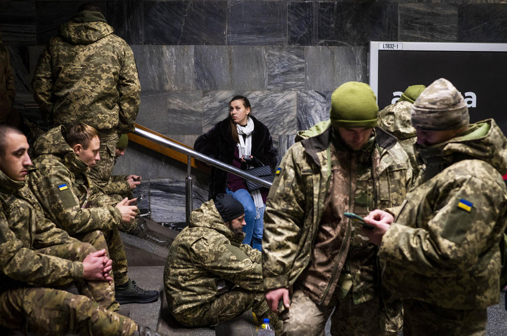 Soldiers take shelter in Lva Tolstoho Metro during an air alert on in Kyiv on Monday. Russia renewed its missile attacks across Ukraine on Monday.